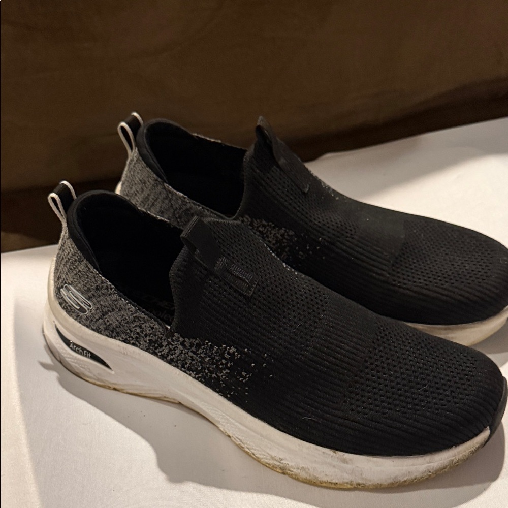 Skechers Women's Black and White Slip-On Athletic Shoes